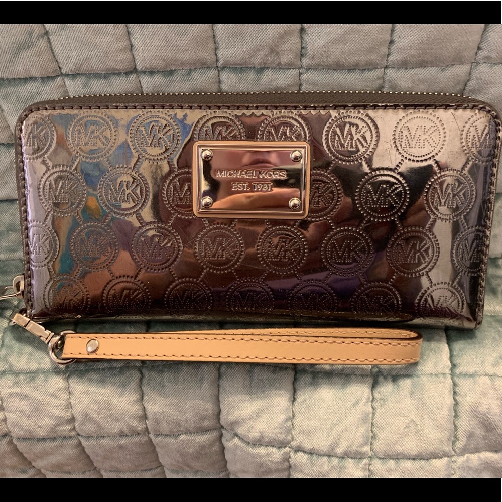 Micheal Kors metallic wristlet.